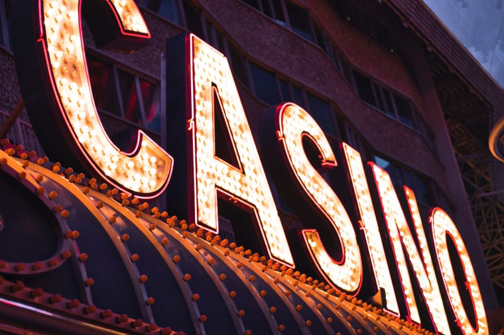 Brightly illuminated casino sign in Las Vegas, capturing the city's vibrant nightlife atmosphere.